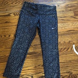 Gray and black patterned Nike leggings